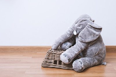 cute-fluffy-elephant-doll-isolated-floor